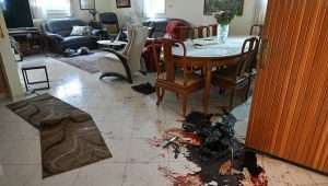 The bloody floor of a home in Kibbutz Be'eri after Hamas terrorists carried out a brutal massacre on Oct. 7. Photo by Kobi Gideon/GPO.