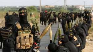 Just three days before the massacre: Members of the Al-Quds Brigades, the military wing of Islamic Jihad, hold a major military parade and unveiling of new rockets in Gaza City to mark the 36th anniversary of the group's establishment. Photo: Atia Mohammed/Flash90