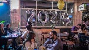 Israelis celebrating the new year on New Year's Eve, at a Pub in Tel Aviv, December 31, 2023. Photo by Avshalom Sassoni/Flash90