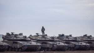 Tanks at a staging area near the Israeli-Gaza border, southern Israel, January 1, 2024. Photo by Chaim Goldberg/Flash90