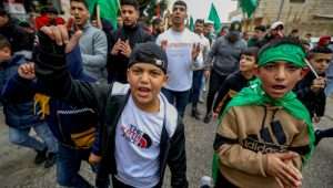 Hamas supporters march in the so-called "West Bank." Photo by Flash90