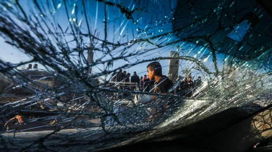 Palestinians at the site of a destroyed building from an Israeli air strike in Rafah, in the southern Gaza Strip, on Jan. 7, 2024. Photo by Abed Rahim Khatib/Flash90.