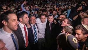 Israeli government ministers encourage participants in a "victory conference" that called for resettling Jews in the Gaza Strip. Photo by Chaim Goldberg/Flash90