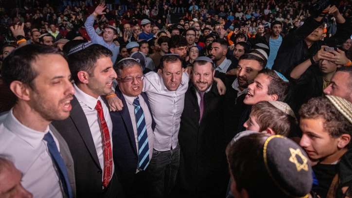 Israeli government ministers encourage participants in a "victory conference" that called for resettling Jews in the Gaza Strip. Photo by Chaim Goldberg/Flash90