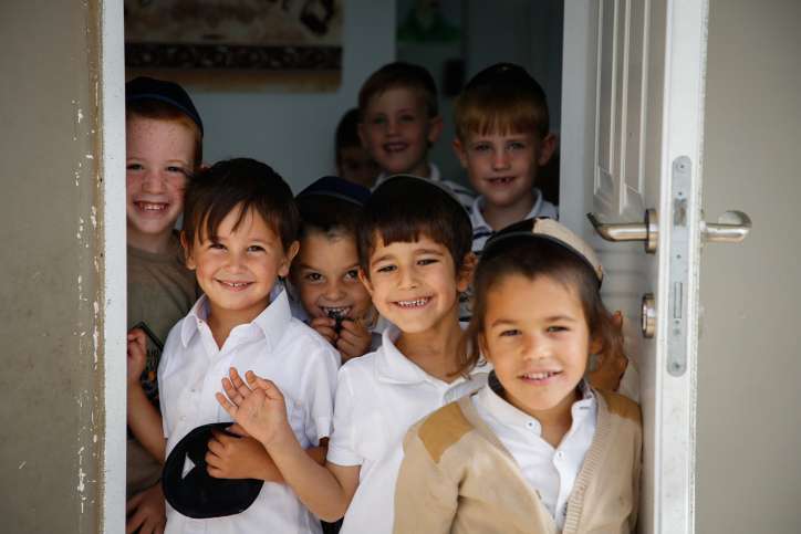 Illustration. Children at a Jewish 'settlement' in the Biblical heartland. Photo by Gershon Elinson/Flash90