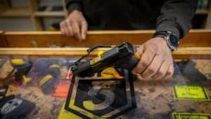 A Vendor sells guns at Jerusalem shooting range, following the recent wave of terror attacks in Israel. April 3, 2022. Photo by Yonatan Sindel/Flash90