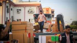 Palestinians unload medical aid from a truck at the Nasser hospital in Khan Yunis, in the southern Gaza Strip, on Oct. 23, 2023. Photo by Atia Mohammed/Flash90.