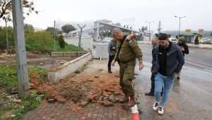 Israeli security personnel at the scene where a rocket fired from Lebanon hit Safed, Feb. 14, 2024. Photo by David Cohen/Flash90.