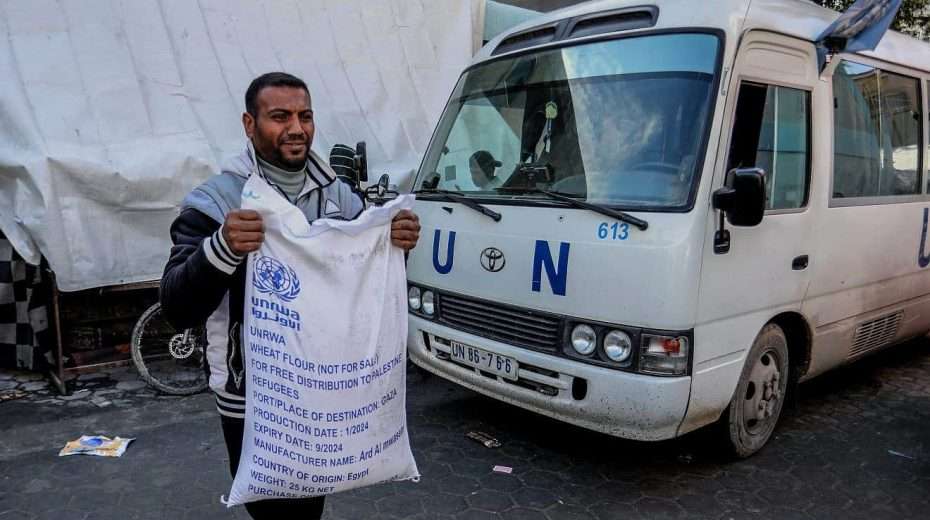 Palestinians receive food supplies at an UNRWA school, in Rafah, in the southern Gaza Strip, on Jan. 28, 2024. Photo by Abed Rahim Khatib/Flash90.