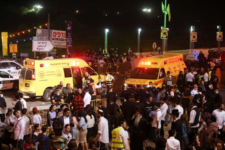 Israeli rescue forces and police at the scene after a mass fatality scene during the celebrations of the Jewish holiday of Lag Baomer on Mt. Meron, in northern Israel on April 30, 2021. Photo by David Cohen/Flash90