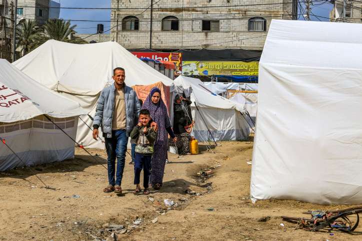Palestinians who were evacuated from their homes Khan Yunis seen near their tents in Rafah, in the southern Gaza Strip on February 24, 2024. Photo by Abed Rahim Khatib/Flash90