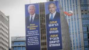 A billboard in Tel Aviv reminds Biden that a majority of Israelis elected Netanyahu and his government, and support their policies in making war on Hamas. Photo by Miriam Alster/FLASH90