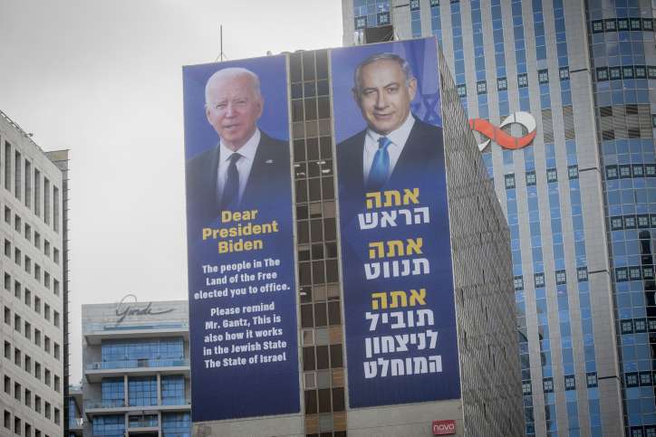A billboard in Tel Aviv reminds Biden that a majority of Israelis elected Netanyahu and his government, and support their policies in making war on Hamas. Photo by Miriam Alster/FLASH90