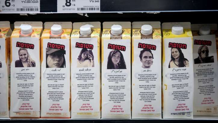 Stickers with photos and descriptions of Israelis held hostage by Hamas terrorists in Gaza, been posted on milk cartons at a super market in Tel Aviv, by Israelis calling for a release of the hostages now. March 20, 2024. Photo by Miriam Alster/FLASH90