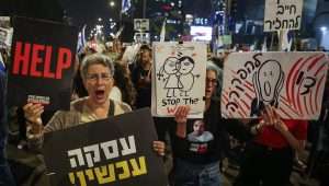 Protesters at Defense Ministry headquarters in Tel Aviv call for the ouster of Prime Minister Benjamin Netanyahu and the immediate release of the hostages held in Hamas captivity, March 30, 2024. Photo by Itai Ron/Flash90.