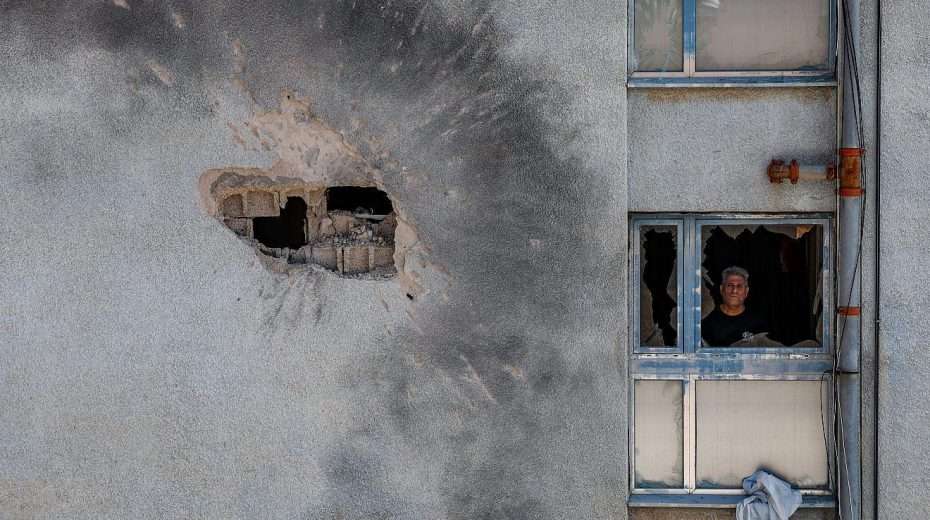 The damage after a rocket fired from Lebanon hit a building in the northern Israeli town of Kiryat Shmona, Feb. 11, 2024. Photo by David Cohen/Flash90.