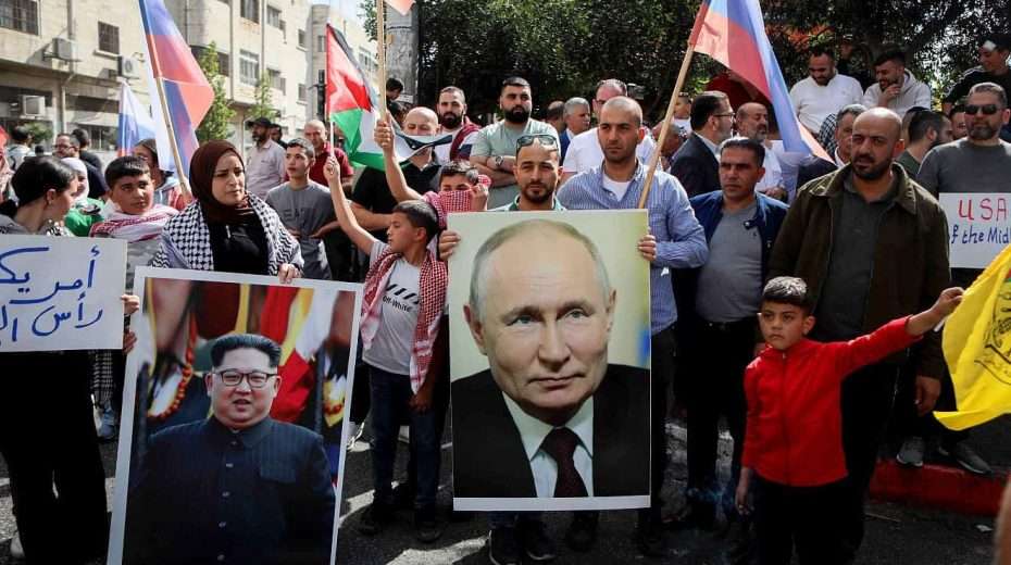 Palestinians in Hebron protest on behalf of their brethren in Gaza, with posters of Russian President Vladimir Putin and North Korean leader Kim Jong-un, following Hamas's Oct. 7 massacre of Israelis., Oct. 20, 2023. Photo by Wisam Hashlamoun/Flash90.