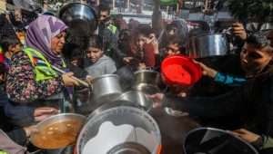 People line up for food in the Gaza Strip. Photo: Shutterstock