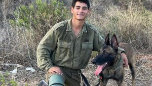 Oketz canine unit member Staff Sgt. David Sasson, 21, who was killed in action in the southern Gaza Strip on March 6, 2024. Credit: IDF.