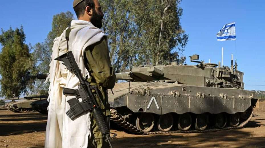 An Israeli soldier during morning prayers near the border with Lebanon, Oct. 25, 2023. Photo by Michael Giladi/Flash90.