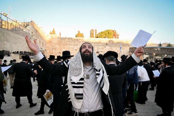 There is only one source of victory and peace for Israel. Orthodox Jewish men beseech the Almighty in the midst of the Iron Swords War. Photo by Arie Leib Abrams/Flash90