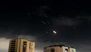 Air defense systems fire interceptors at drones and missiles fired from Iran, over Tel Aviv on April 14, 2024. Source: Tomer Neuberg/Flash90