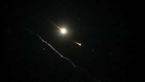 Anti-missile system fires interception missiles at drones and missiles fired from Iran, as it seen over the Judean city of Hebron, on April 14, 2024. Photo by Wisam Hashlamoun/Flash90.