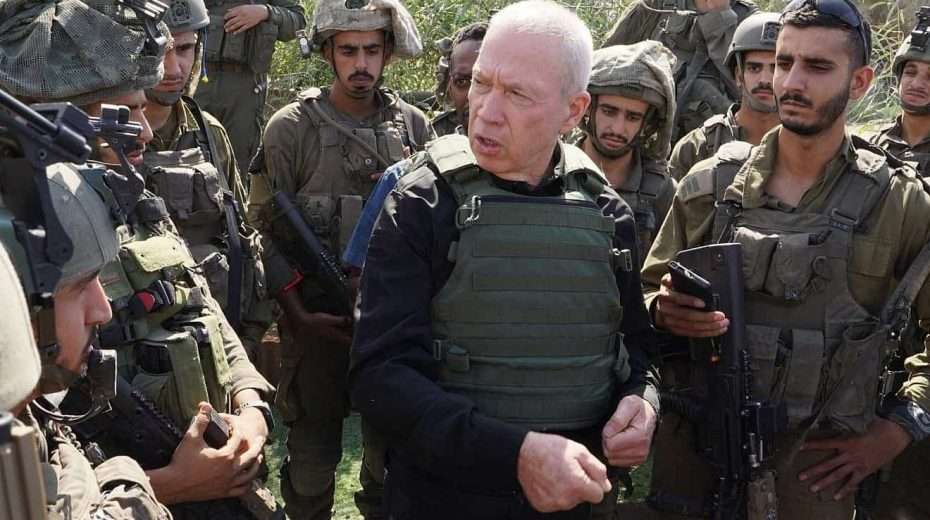 Defense Minister Yoav Gallant speaks with troops near the Gaza border, Oct. 15, 2023. Photo by Ariel Hermoni/Israel Ministry of Defense.