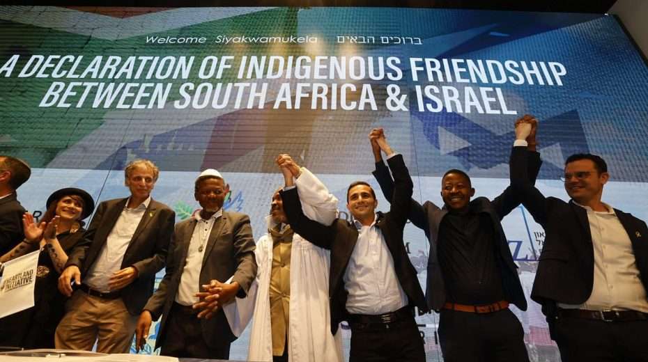 Members of the South Africa-based Nazareth Baptist Church sign a declaration of friendship with Israel at the Friends of Zion Museum in Jerusalem, May 12, 2024. Credit: Yossi Zamir.