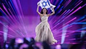 Eden Golan representing Israel with the song 'Hurricane' is presented with the flag of Israel before the final of the 68th edition of the Eurovision Song Contest (ESC) at the Malmo Arena, in Malmo, Sweden, 11 May 2024. EPA-EFE/JESSICA GOW