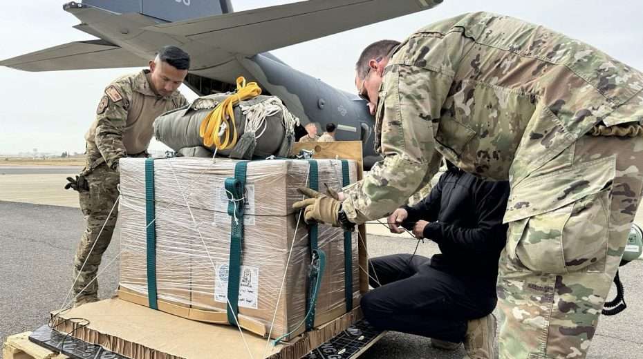 US Air Force loadmasters arrange bundles of humanitarian aid destined for an airdrop over the Gaza Strip onto a HC-130J Combat King II at an undisclosed location within the US Central Command area of responsibility on March 20, 2024. Credit: US Air Force Photo.