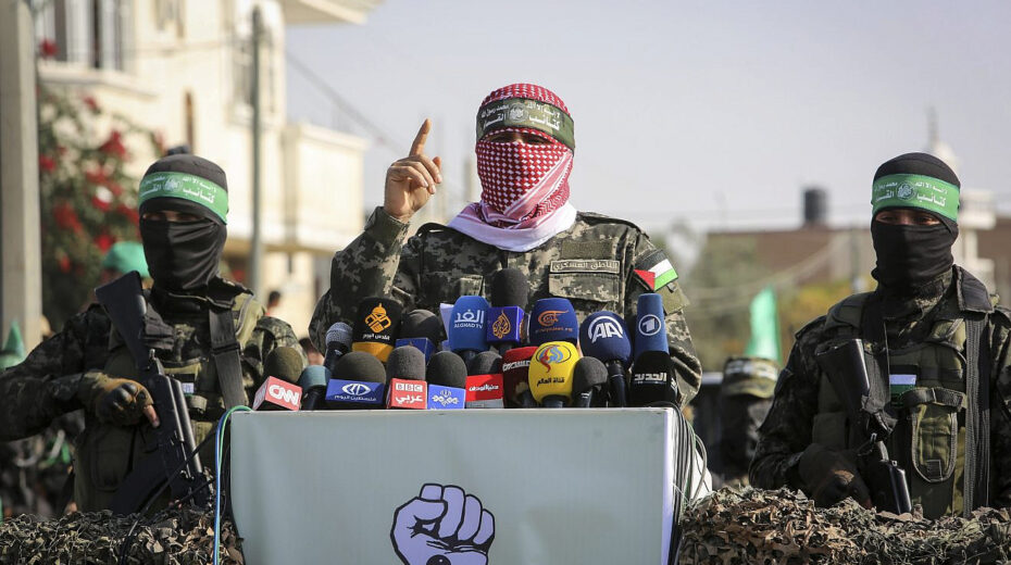 Abu Ubaida (center), the spokesman of the Izz al-Din al-Qassam Brigades, the "military" wing of Hamas, speaks in the southern Gaza Strip on Nov. 11, 2019. Photo by Abed Rahim Khatib/Flash90.
