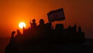 Israeli tanks at sunset near Israel's southern border with Gaza, October 12, 2023. Photo: Chaim Goldberg/Flash90