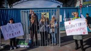 Activists protest against United Nations Relief and Works Agency for Palestine Refugees (UNRWA) outside their offices in Jerusalem, April 9, 2024. Photo by Yonatan Sindel/Flash90