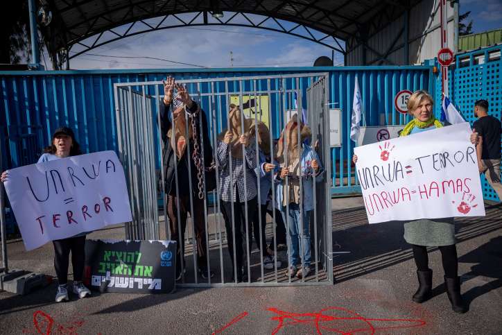 Activists protest against United Nations Relief and Works Agency for Palestine Refugees (UNRWA) outside their offices in Jerusalem, April 9, 2024. Photo by Yonatan Sindel/Flash90