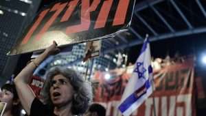 Demonstrators protest calling for the release of Israeli hostages held in the Gaza Strip outside Hakirya Base in Tel Aviv, May 22, 2024. Photo by Tomer Neuberg/Flash90.