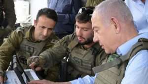 Prime Minister Benjamin Netanyahu speaks to IDF soldiers during a visit to the northern border, May 28, 2024. Photo by Amos Ben-Gershom/GPO.