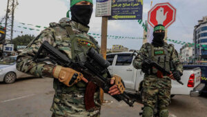 Members of Izz al-Din al-Qassam Brigades, the "military" wing of the Palestinian terrorist organization Hamas, stand guard in Rafah in the southern Gaza Strip, Dec. 14, 2022. Photo by Abed Rahim Khatib/Flash90.