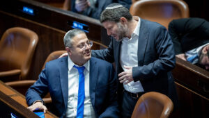 Itamar Ben-Gvir and Bezalel Smotrich attend a plenum session on forming the government, in the Israeli parliament, on December 29, 2022. Photo by Yonatan Sindel/Flash90.