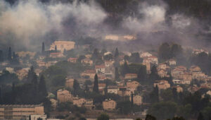 Smoke from a large fire caused by rockets fired from Lebanon, in the northern Israeli town of Kiryat Shmona, June 3, 2024. Photo by Ayal Margolin/Flash90.
