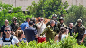 Rescued hostages Andrey Kozlov, Almog Meir Jan and Shlomi Ziv arrive at the Sheba Medical Center in Ramat Gan, June 8, 2024. Photo by Avshalom Sassoni/Flash90.