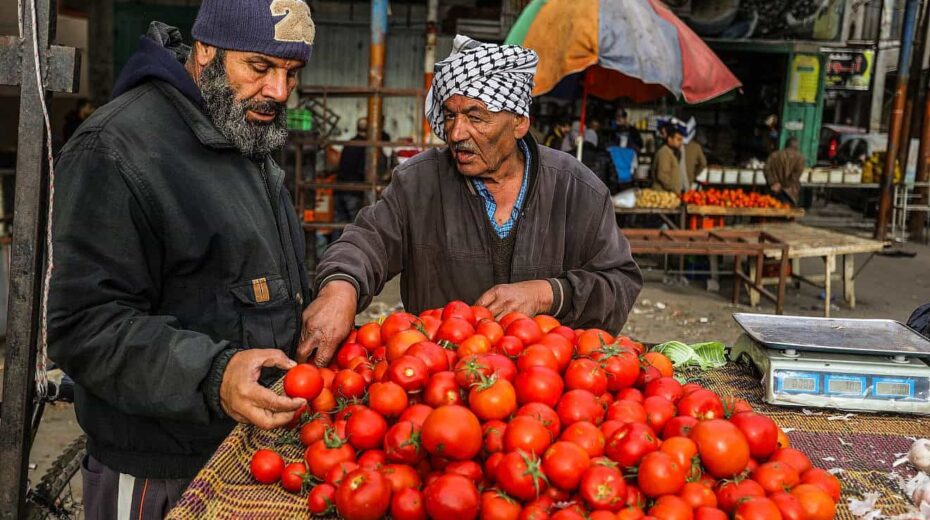 Palestinians shop for fruit and vegetables at a market in Rafah, in the southern Gaza Strip, on Jan. 13, 2024. Photo by Abed Rahim Khatib/Flash90.