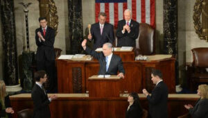 Israeli Prime Minister Benjamin Netanyahu waves to the crowd during his address to a joint session of Congress, March 3, 2015. Credit: Amos Ben Gershom/GPO.