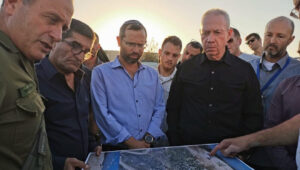 Israel Gantz, head of the Binyamin Regional Council and Yesha Council, shows a map to Defense Minister Yoav Gallant (r). Credit: Binyamin Regional Council.