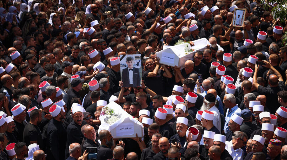 Mourners attend the funeral in Majdal Shams of Druze children killed by a Hezbollah rocket fired from Lebanon, July 28, 2024. Photo by Ayal Margolin/Flash90.
