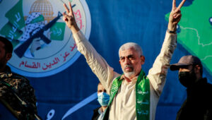 Yahya Sinwar, leader of the Palestinian Hamas movement, gestures on stage during a rally in Gaza City, on May 24, 2021. Photo by Atia Mohammed/Flash90