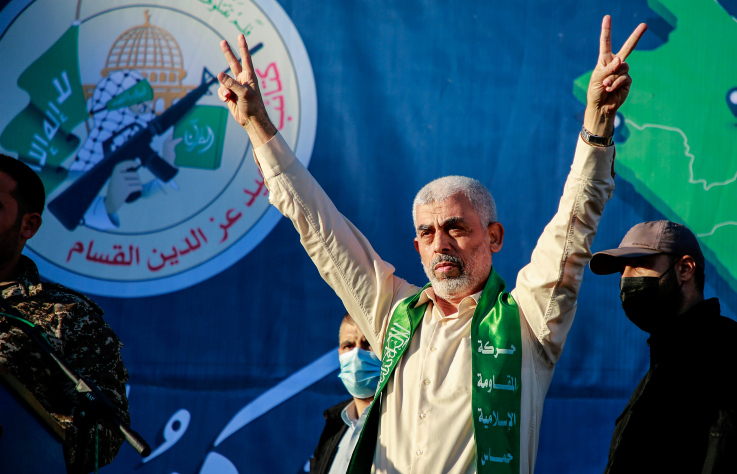 Yahya Sinwar, leader of the Palestinian Hamas movement, gestures on stage during a rally in Gaza City, on May 24, 2021. Photo by Atia Mohammed/Flash90