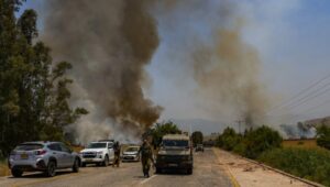 Israeli soldiers at the site of a major fire caused by rockets from Lebanon on June 14, 2024 near Kibbutz Kfar Szold in northern Israel. Photo: Ayal Margolin/Flash90