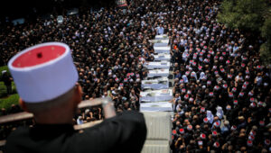 Family members and friends attend the funderal for Druze children killed on a soccer field by a rocket fired from Lebanon in the Druze village of Majdal Shams in the Golan Heights on July 28, 2024. Photo: Jamal Awad/Flash90