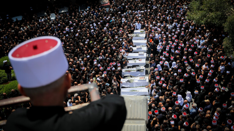 Family members and friends attend the funderal for Druze children killed on a soccer field by a rocket fired from Lebanon in the Druze village of Majdal Shams in the Golan Heights on July 28, 2024. Photo: Jamal Awad/Flash90